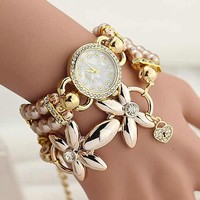 Pearl winding bracelet watch