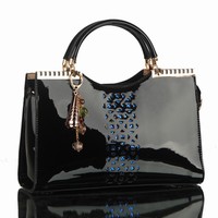 Patent leather hollow fashion portable package